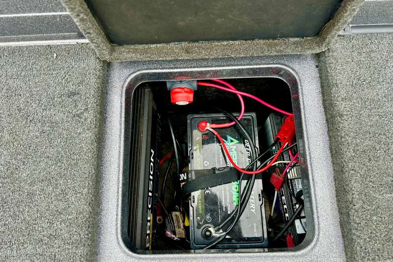 Slide: The Image of Battery compartment of a 2009 Ranger 620VS Fisherman boat with wiring and components. - 41
