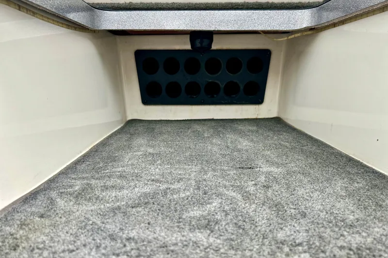 Slide: The Image of Interior view of a 2009 Ranger 620VS Fisherman boat storage compartment. - 50