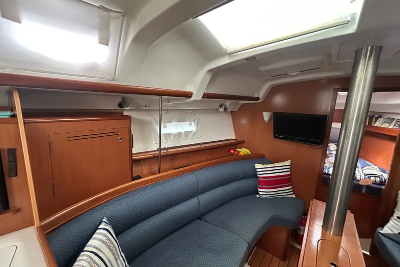 Slide: The Image of Interior of 2009 Beneteau 343 yacht with cozy seating and modern amenities. - 21