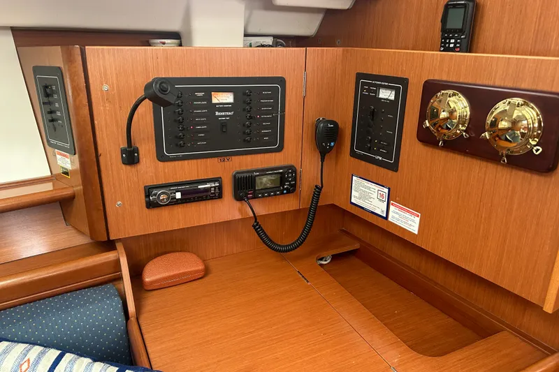 Slide: The Image of Interior control panel of a 2009 Beneteau 343 sailboat with navigation equipment. - 23