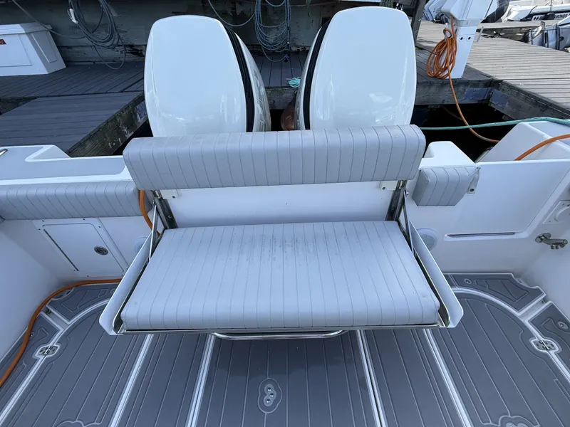 Slide: The Image of The 2020 NorthCoast 285 HT features a foldable bench seat in the cockpit area. - 14