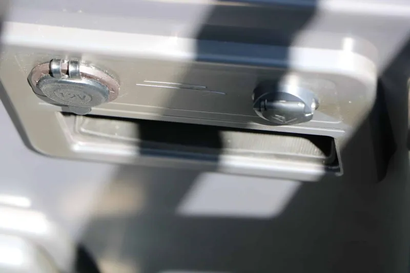 Slide: The Image of Close-up of a boat panel with a 12V socket and USB port. - 42