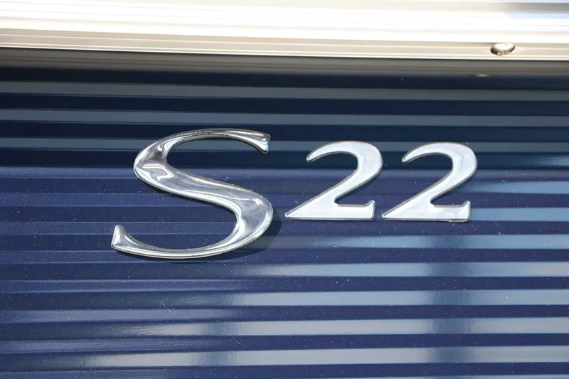 Slide: The Image of Close-up of the "S 22" logo on a blue background. - 11