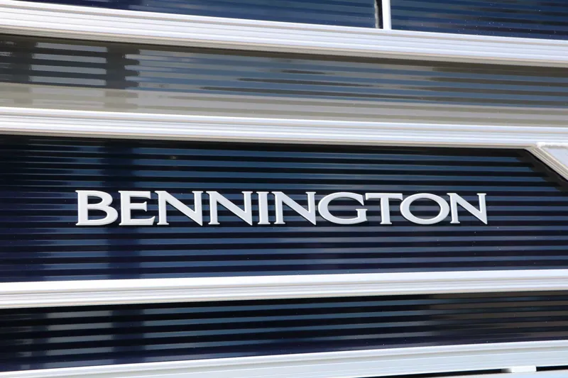 Slide: The Image of Close-up of the Bennington logo on a 2027 22 SSR Tri Toon. - 10