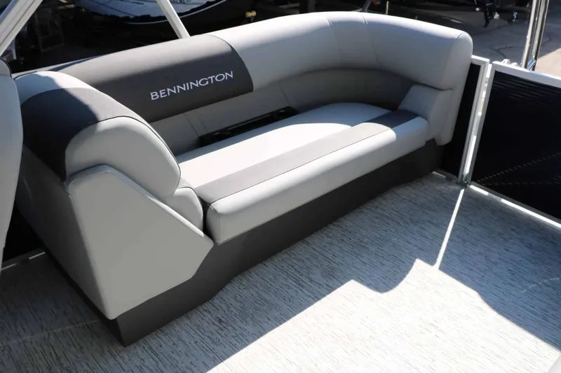 Slide: The Image of The image shows a gray seating area on a Bennington boat. - 47