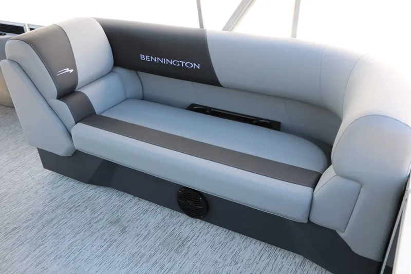 Slide: The Image of Gray and black bench seat with Bennington logo on a boat. - 30