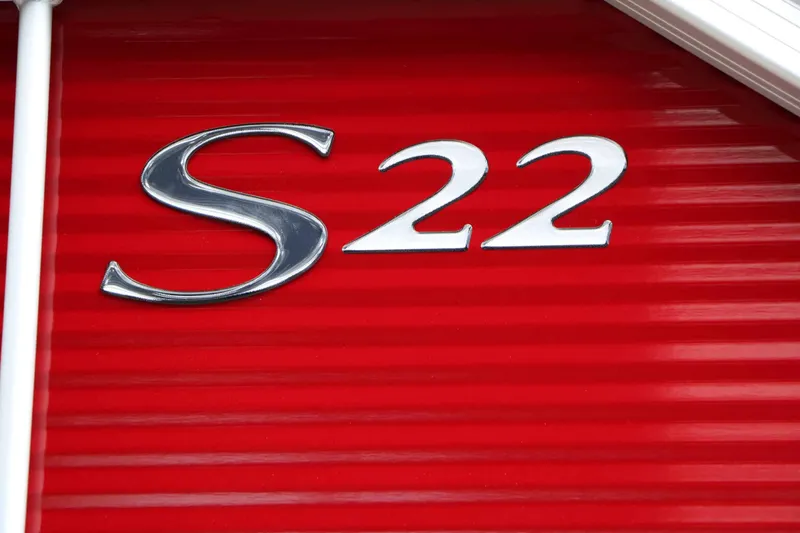 Slide: The Image of Close-up of the "S22" lettering on a red background. - 10