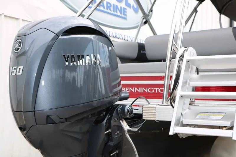 Slide: The Image of A 2027 Bennington 22 SSB Tri Toon with a Yamaha 150 outboard motor. - 19
