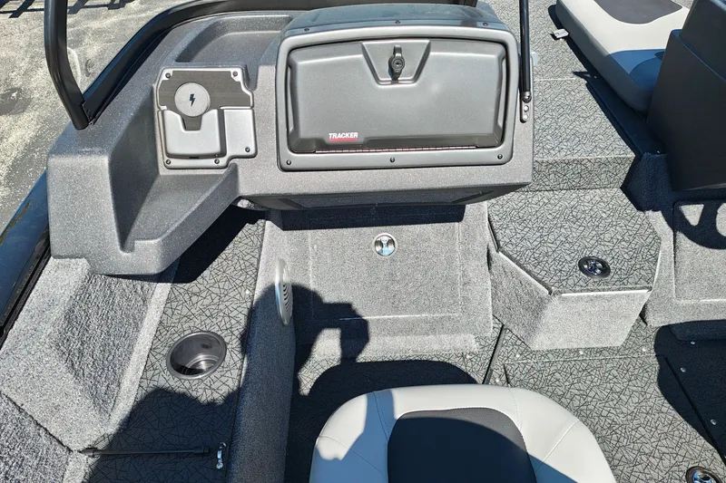 Slide: The Image of Interior of 2027 Tracker Pro Guide V-175 Combo boat with seating and storage compartments. - 22