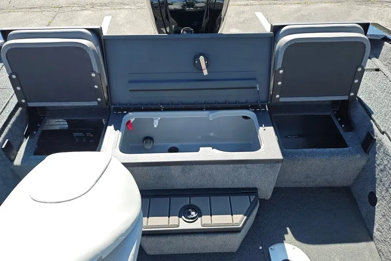 Slide: The Image of 2027 Tracker Pro Guide V-175 Combo boat interior with storage compartments open. - 41