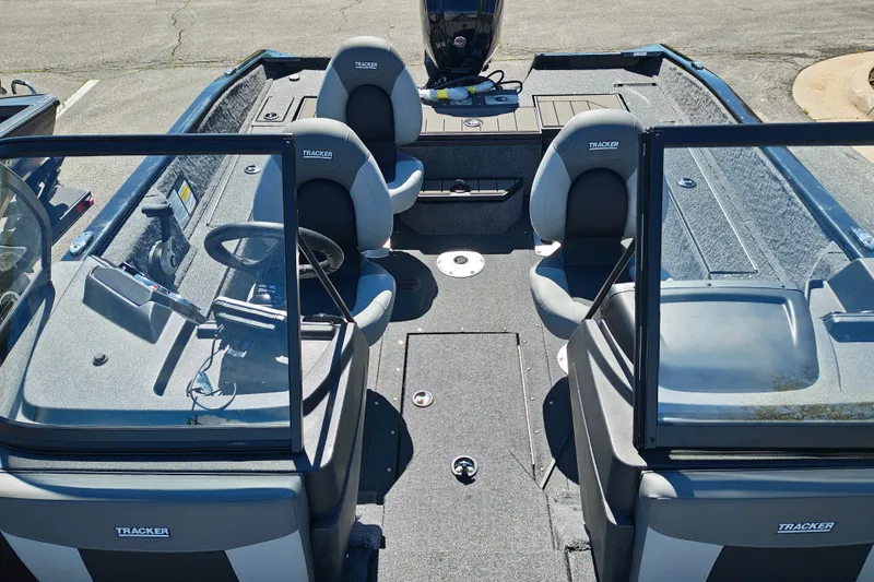 Slide: The Image of 2027 Tracker Pro Guide V-175 Combo boat interior with seating and steering console. - 32