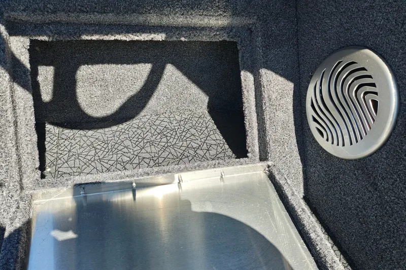 Slide: The Image of Interior detail of 2027 Tracker Pro Guide V-175 Combo boat with speaker and textured surface. - 17