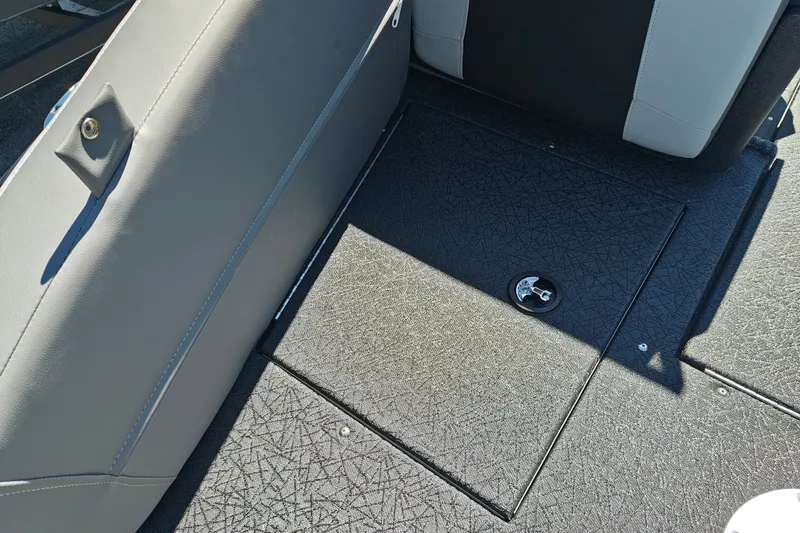 Slide: The Image of 2027 Tracker Pro Guide V-175 Combo boat interior with textured flooring and seating. - 28