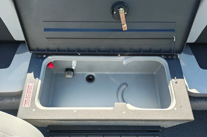 Slide: The Image of Open storage compartment in 2027 Tracker Pro Guide V-175 Combo boat. - 38