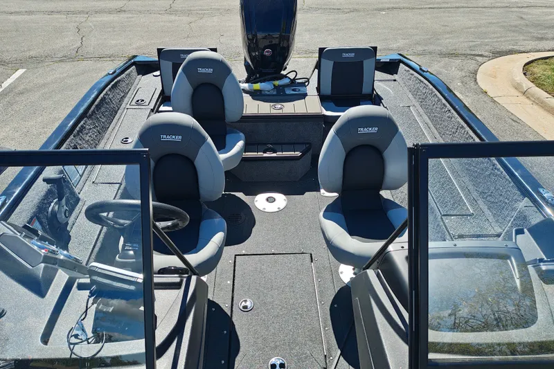 Slide: The Image of 2027 Tracker Pro Guide V-175 Combo boat interior with seating and steering console. - 33