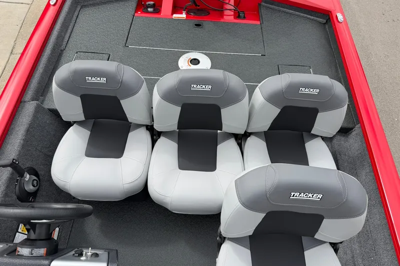 Slide: The Image of 2027 Tracker Pro Team 175 Crappie Edition boat seats, gray and black upholstery. - 15