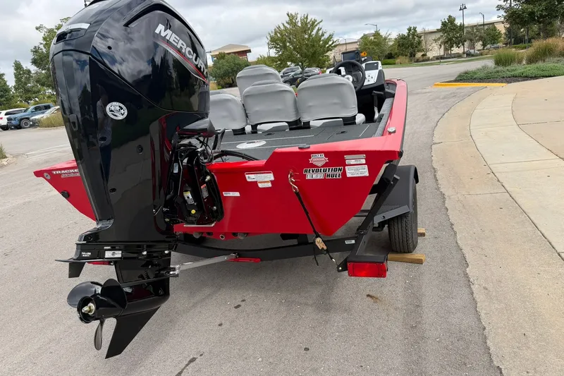Slide: The Image of 2027 Tracker Pro Team 175 Crappie Edition boat with Mercury engine on trailer. - 42