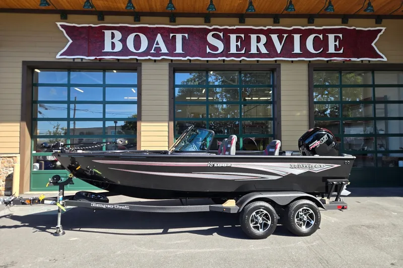 The Image of 2026 Ranger VS1882SC Angler boat on trailer outside boat service center. - 0