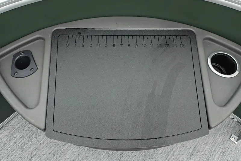 Slide: The Image of Sun Tracker Fishin' Barge 22 XP3, 2027 model, featuring a measuring board and cup holder. - 48