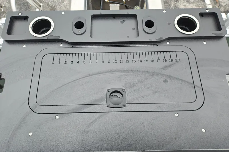 Slide: The Image of 2027 Sun Tracker Fishin' Barge 22 XP3 fishing station with integrated ruler and cup holders. - 35