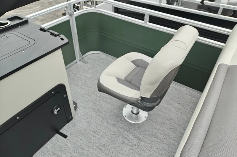 Slide: The Image of 2027 Sun Tracker Fishin' Barge 22 XP3 interior with swivel seat and console. - 31