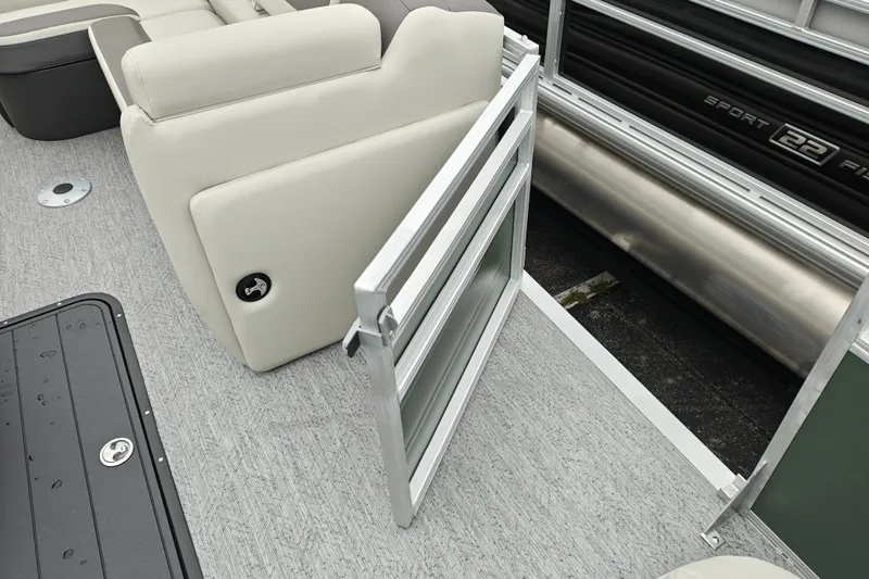 Slide: The Image of 2027 Sun Tracker Fishin' Barge 22 XP3 interior with open gate and seating. - 15