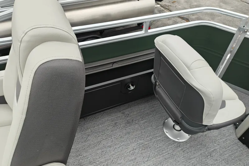 Slide: The Image of 2027 Sun Tracker Fishin' Barge 22 XP3 interior seating with gray and white upholstery. - 29