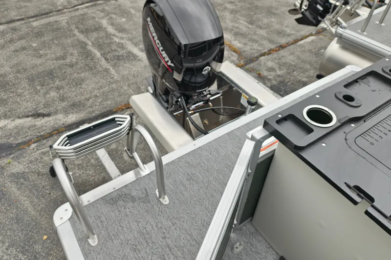 Slide: The Image of 2027 Sun Tracker Fishin' Barge 22 XP3 with Mercury outboard motor and fishing station. - 38