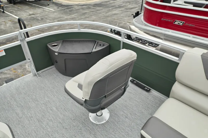 Slide: The Image of 2027 Sun Tracker Fishin' Barge 22 XP3 interior with seating and fishing station. - 44