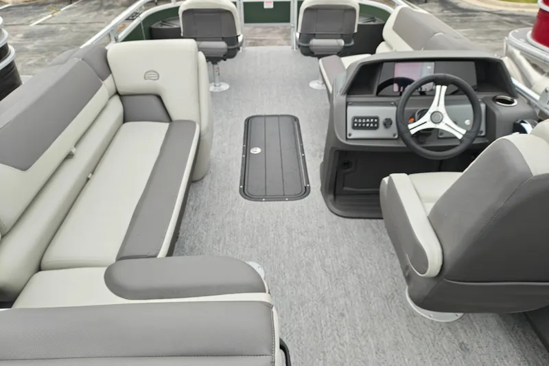 Slide: The Image of 2027 Sun Tracker Fishin' Barge 22 XP3 interior with seating and steering console. - 41