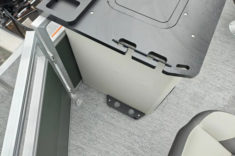 Slide: The Image of 2027 Sun Tracker Fishin' Barge 22 XP3 interior detail with seating and railing. - 37
