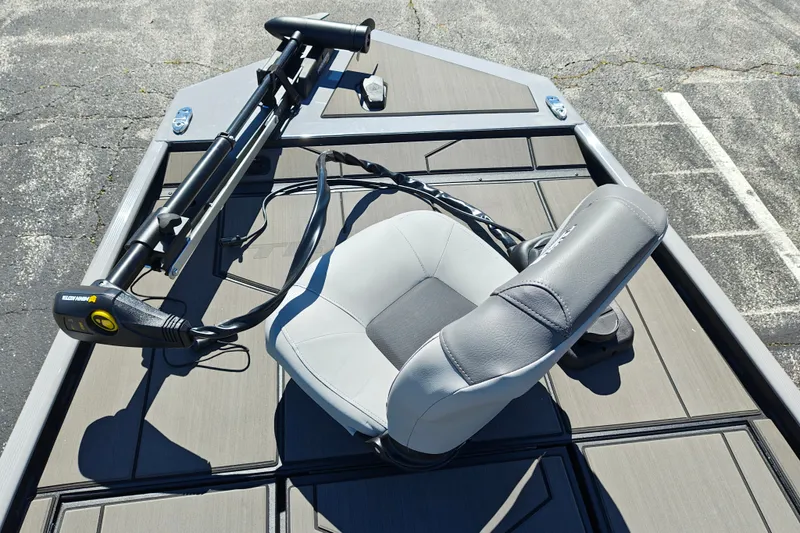 Slide: The Image of 2027 Tracker Pro 170 boat deck with seat and trolling motor. - 21