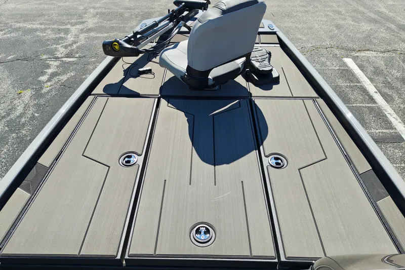 Slide: The Image of 2027 Tracker Pro 170 boat deck with seating and storage compartments. - 19