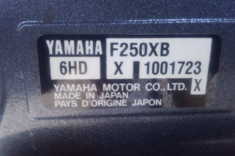 Slide: The Image of Yamaha F250XB engine label on 2018 Cobia 220 Center Console, made in Japan. - 18
