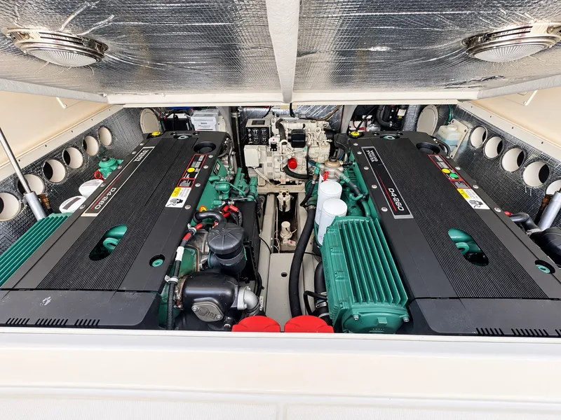 Slide: The Image of Engine compartment of a 2005 Carolina Classic 28 Express with two large engines. - 22