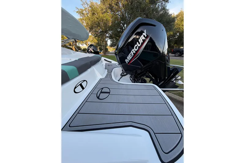 Slide: The Image of 2026 Tahoe T18 boat with Mercury engine, featuring sleek design and modern detailing. - 4