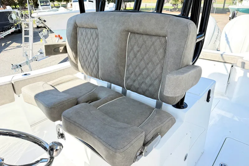Slide: The Image of 2026 Sea Hunt Gamefish 30CB boat with luxurious gray seating and diamond stitching. - 19