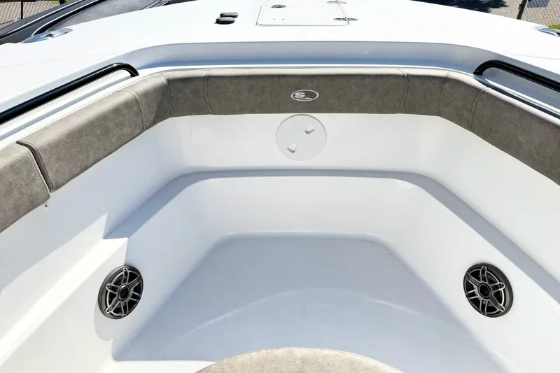 Slide: The Image of 2026 Sea Hunt Gamefish 30CB boat interior with cushioned seating and built-in speakers. - 29