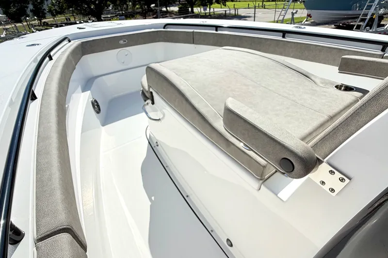 Slide: The Image of 2026 Sea Hunt Gamefish 30CB boat interior with cushioned seating and sleek design. - 25