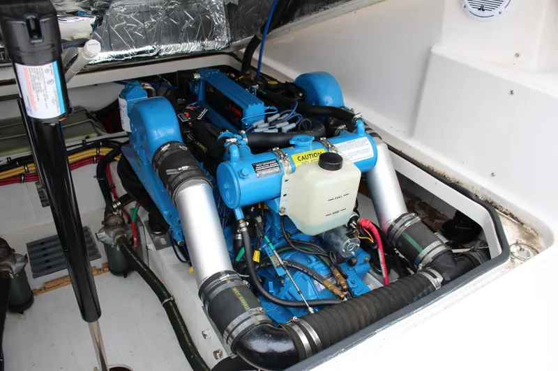 Slide: The Image of Engine compartment of a 2001 Tiara Yachts 2900 Coronet, showcasing a well-maintained marine engine. - 38