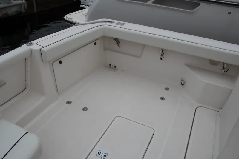 Slide: The Image of 2001 Tiara Yachts 2900 Coronet boat interior, featuring spacious seating and clean design. - 34