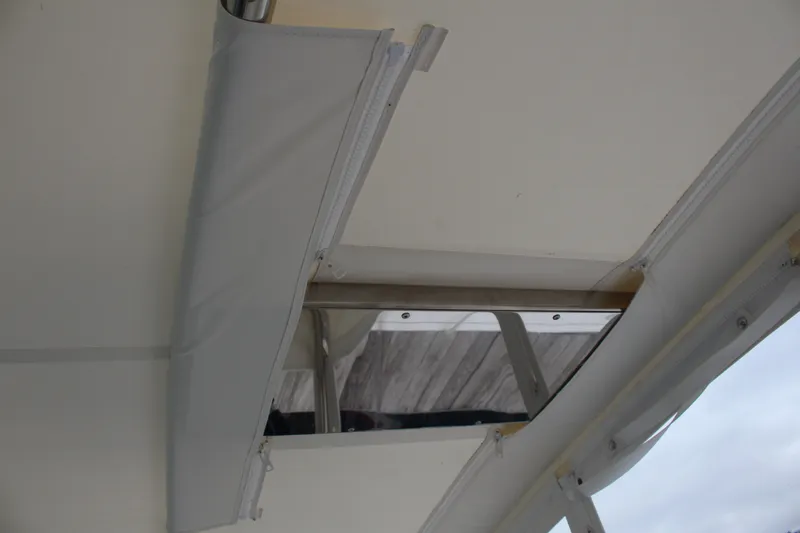 Slide: The Image of 2001 Tiara Yachts 2900 Coronet interior detail with open hatch and canvas cover. - 40