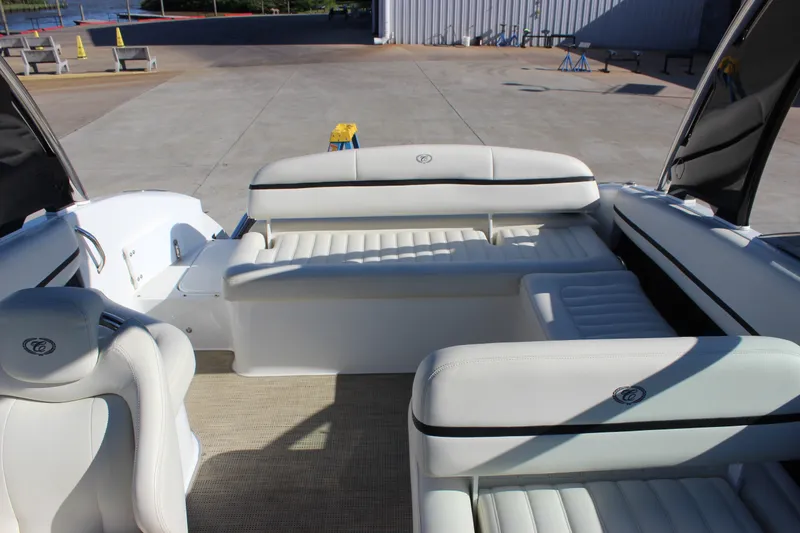 Slide: The Image of 2016 Cobalt R5 WSS boat interior with white leather seating and spacious layout. - 19