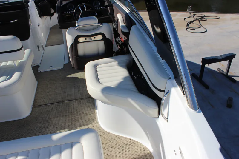 Slide: The Image of Interior of 2016 Cobalt R5 WSS boat with white seating and steering console. - 14