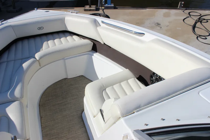 Slide: The Image of Luxurious seating area on a 2016 Cobalt R5 WSS boat, featuring white upholstery. - 51