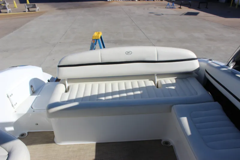 Slide: The Image of 2016 Cobalt R5 WSS boat interior with white cushioned seating. - 53