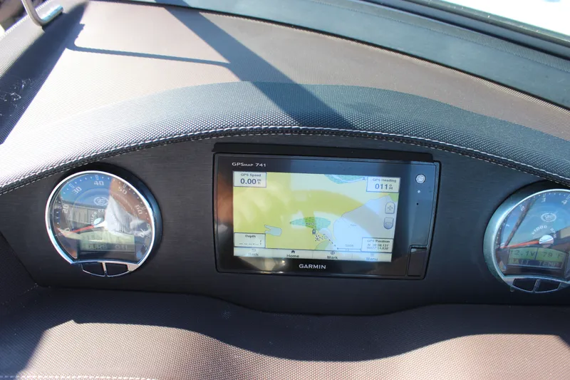 Slide: The Image of Dashboard of a 2016 Cobalt R5 WSS boat with Garmin GPS and gauges. - 48