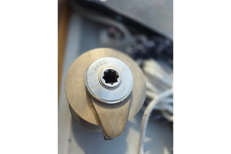 Slide: The Image of Close-up of an Asahi Japan winch handle on a Newport 41, 1970 model. - 19