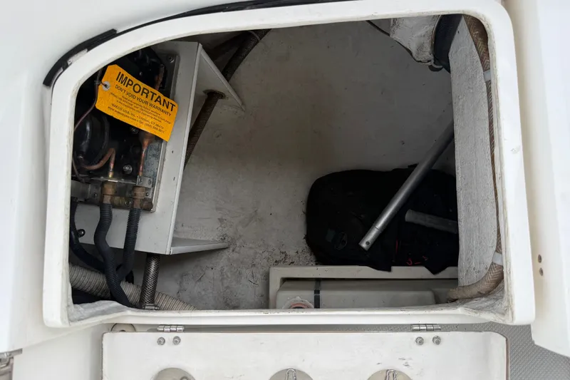 Slide: The Image of Open hatch of 2007 Catalina 34 MkII sailboat showing interior compartment and equipment. - 40