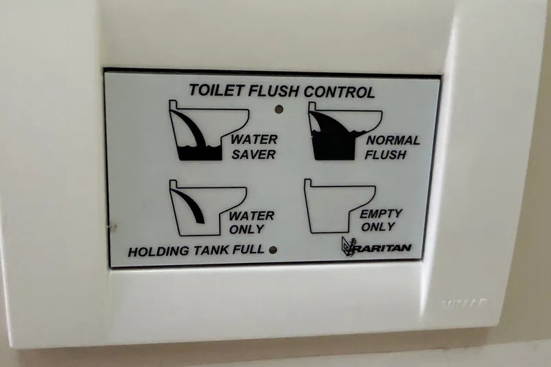 Slide: The Image of Toilet flush control panel on Catalina 34 MkII, 2007 model, with multiple flush options. - 67